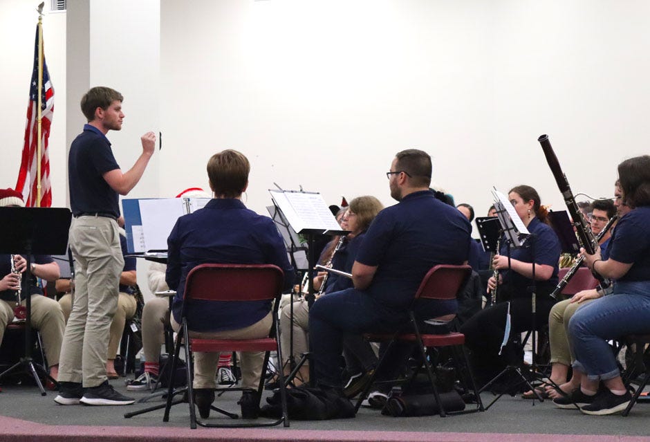 Stuart Campbell, Baker School band director, conducts the North Okaloosa Community Band’s 2020 Christmas concert. He will also co-conduct the band’s May 3 spring concert.