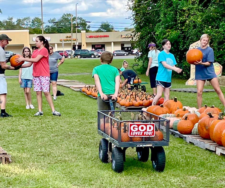 Children at First United Methodist Church of Crestview unload a truck of pumpkins to prepare for the church's pumpkin patch fundraiser.  "Our children have worked so hard to participate in this fundraiser and begin what we hope to be a tradition for our ministry," a church spokesperson said.