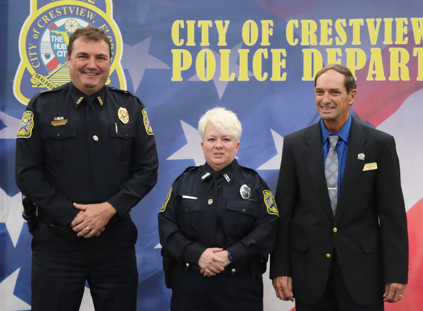 Crestview Police Department Officer Kimberley Beasley poses with Police Chief Stephen McCosker and Mayor JB Whitten following her swearing-in Sept. 16 in Crestview.