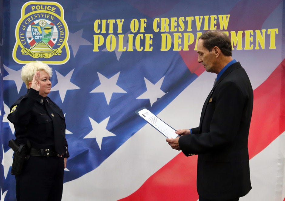 Mayor JB Whitten swears in Crestview’s newest police officer, Kimberley Beasley, in Warriors Hall Sept. 16 in Crestview.