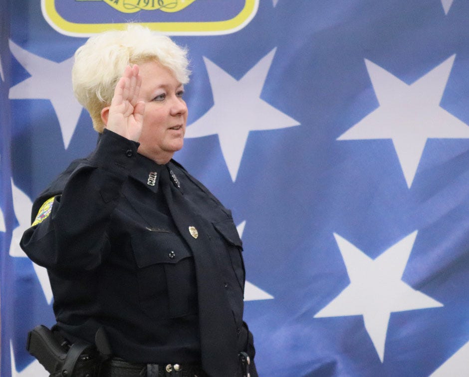 Crestview Police Department Officer Kimberley Beasley recites the oath of office during her swearing in ceremony as its newest police officer Sept. 16 in Crestview.