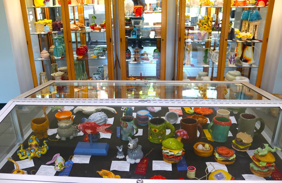 A colorful exhibit of student artists’ 3D works greets Crestview Public Library patrons in the lobby.