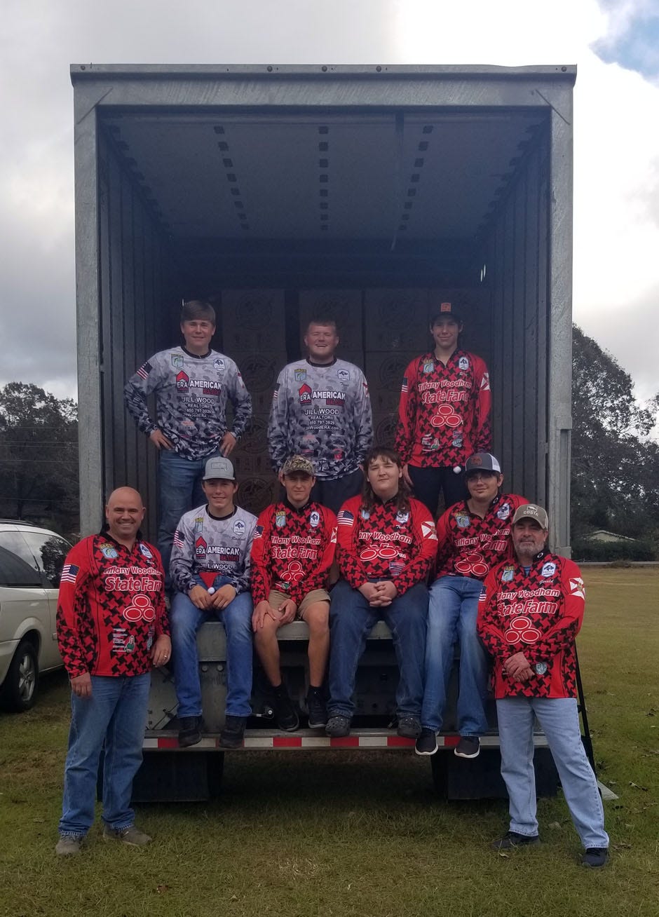 The teams in the Okaloosa and Walton County region were happy to reach their goal of 10,000 boxes donated to the Operation Christmas Child program. The Emerald Coast Youth Bassmasters helped load the semi for delivery, as well as said prayers over the boxes before they were loaded.