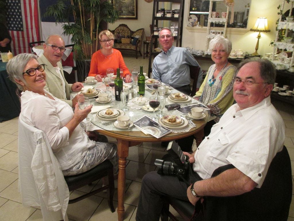 Visitors from Crestview's French sister city, Noirmoutier, and their American hosts pause during their Guest Chefs' Dinner in October last year in Crestview. From left are Marie-Therese and Gerard Moreau, Danielle Marquet, Joe and Pam Coffield, and Alain Marquet.