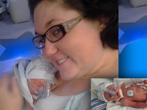 Lyndsey Brooks holds her newborn, Savannah Lynn, at Sacred Heart Hospital. Savannah Lynn and her twin sister, Hannah Kathleen (inset) — born Thursday — shared the same amniotic sac and placenta for 32 weeks.