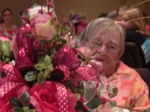 Grace Bratton, 92, the oldest mother present, accepted the Mother’s Day bouquet at First United Methodist Church of Crestview's second annual Mother's Day Tea.