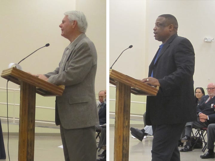 Speakers including Bob Hurst, a representative of the Sons of Confederate Veterans, left, and Raymond Nelson, president of the Okaloosa chapter of the NAACP, addressed both sides of the Crestview Confederate battle flag issue.