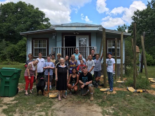 Mission Okaloosa members have taken on several tasks to benefit area residents June 26 through July 1. In this photo, the group gets ready to build a wheelchair ramp for a Crestview resident. Pictured are adult leaders Earl Timmons, Matt Hasty, and Tom Converse with students Parker Athearn, Adam Mistretta, Ethan Parker, Joe Decker, Gage Carter, Harrison Dorsett, Caleigh Lloyd, Gina Locastro, Kallie Rasmussen, Jenna Skalicky, Annie James Walsh, Kathalina Wurst, Jared Chase and Trace Matthews.