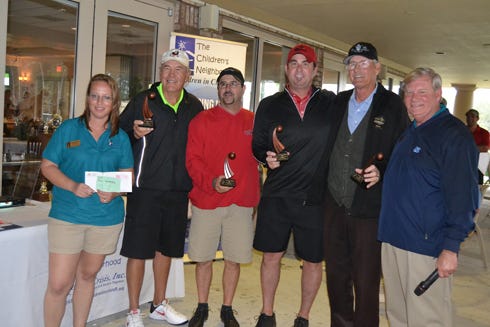 Pictured from left are Laura Moore, CIC Volunteer & Events director, with the winning team of the 10th Annual Children in Crisis Charity Golf Classic: Mike Davis, David Boyd, Rich Chase and John Hicks, along with Ken Hair, CIC president and CEO. The tournament was March 18 in Fort Walton Beach.
