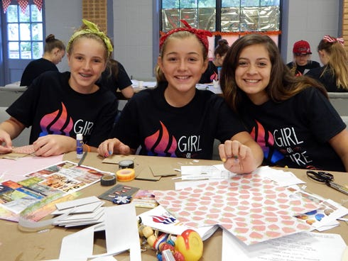Rylee Breen, Julianna Roberts and Olivia Dunn, of the Church of Jesus Christ of Latter-day Saints' Crestview Second Ward, will send inspirational cards to women from around the world.