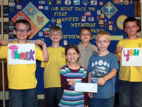 Gaige Cook, Ben Humphrey, Josey Humphrey, Johnny Humphrey, Daniel Henderson and Jonathan Lingerfelter, pictured, along with Cathy Humphrey, Cub Scout Dens 4 and 11 leader, have extra financial support for Pack 799's programs.