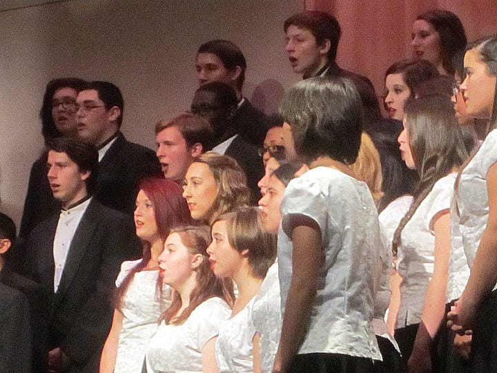 Members of the Chorale elite choir perform during the Crestview High School chorus Christmas Concert.