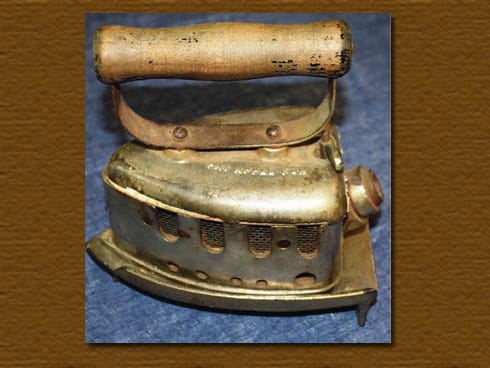 This gas-powered clothes iron is among artifacts in the "Rural Electrification" exhibit, on display now through Jan. 15, 2016 at Heritage Museum of Northwest Florida.