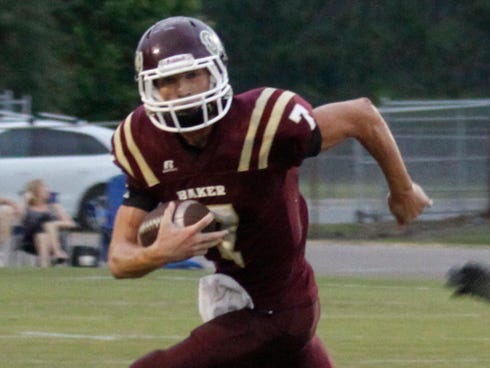Baker School quarterback Jon Beck had more than 300 yards in total offense Friday to lead the Gators past Holmes County.