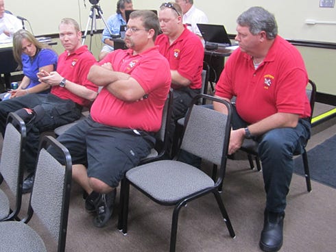 Firefighters attend the Crestview City Council's Thursday evening budget workshop, during which their union president presented a proposal to force upper management into early retirement.