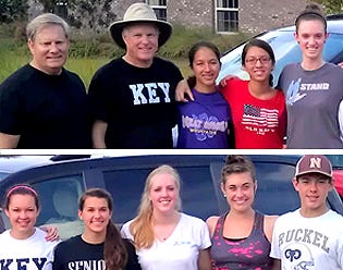 Ken Hair (top row, far left) of Children in Crisis poses with Tim Parsons, Niceville-Valparaiso Kiwanis Key Club coordinator, and members of the Niceville High School Key Club after a recent workday at the CIC Children's Neighborhood.