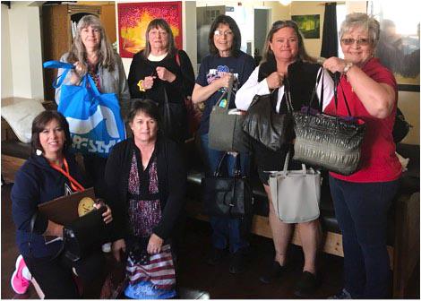 Homelessness isn't just a male issue in our area. Member’s of American Legion Auxiliary Unit 75, located at 898 E. James Lee Blvd. in Crestview, collected totes and purses filled with female items and delivered them to Crestview Area Shelter for the Homeless. In the photo are (top, from left) Shelter President Anne Sprague, Auxiliary members Wynne Keniston, Melody Mintun, Aimee Snelgrove, Auxiliary President Pam Pannasch and (bottom) Shelter Board Member Gina Kirkland, and Auxiliary member Kellee Card. [CONTRIBUTED PHOTO]