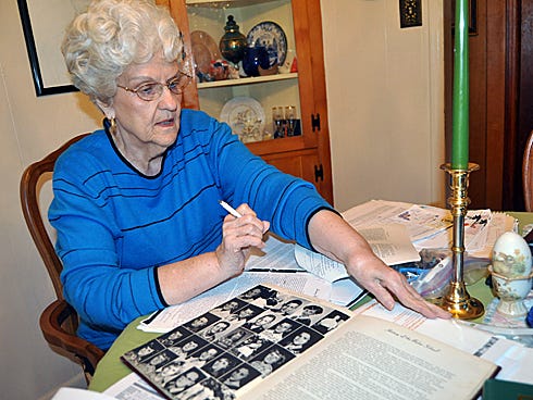 Jeanette Henderson, 82, sorts through historical documents she collected over two years to apply for placement of a Florida historical marker at Baker School.