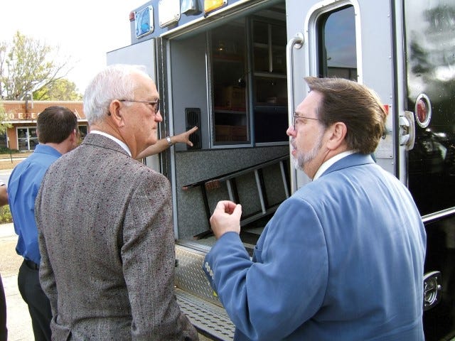 Former Mayor George Whitehurst and Mayor David Cadle inspect the Crestview Police Department Special Weapons and Tactics Team’s new mobile command center in this April 2008 photo.