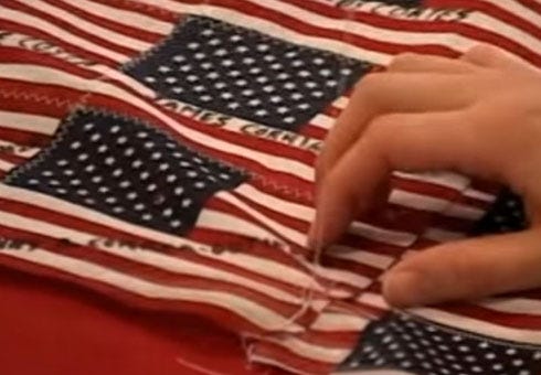 This photo is from the video about the 9/11 international memorial flag created to honor victims of the terrorist attack on the Twin Towers in New York.