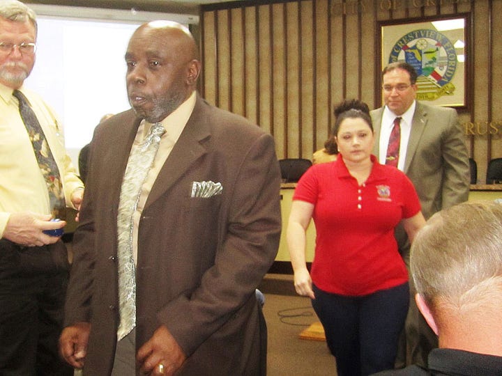 Crestview City Council members Shannon Hayes, Robyn Helt and Thomas Gordon leave the council chamber during Monday night's council meeting to avoid a potential Sunshine Law violation.