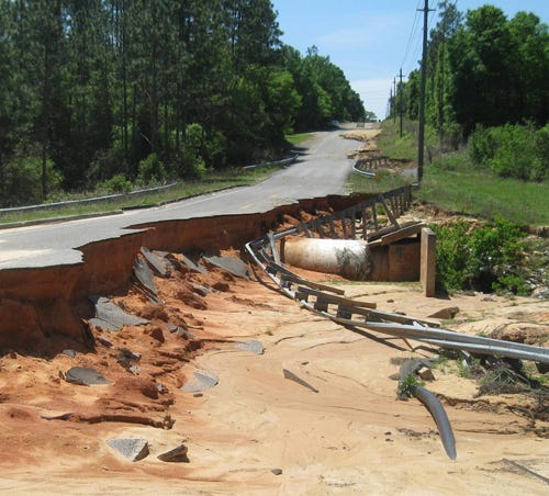 This washout has closed off Oak Hill Road north of Old Bethel Road since the April 2014 storm. Okaloosa County has just received more than half a million dollars in federal mitigation funding to construct a stronger drainage system to prevent future washouts.