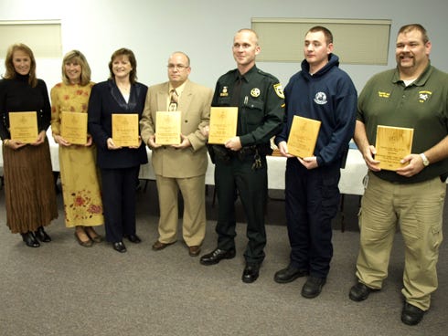 On Oct. 29, members of Concord Lodge No. 50 in Crestview presented community service awards during their Family Night meeting. 
Pictured from left are award recipients Rhonda Day, Crestview High School; Cindy King, Shoal River Middle School; Laura Pink, Antioch Elementary School; Detective Don Howe, who received the award on Inspector David Henry’s behalf, Crestview Police Department; Deputy Heath Hehl II, Okaloosa County Sheriff Department; Mathew Constable, Okaloosa County Emergency Medical Service; and Battalion Chief Tony Holland, Crestview Fire Department.