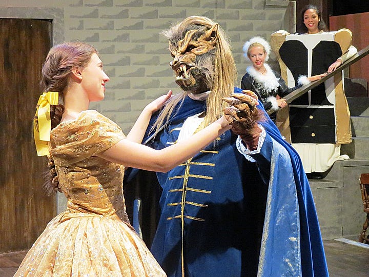 Daniel Thornton of Baker as “the Beast” rehearses with Jordan Van Dyke of Niceville as “Beauty” in the Sprint Theater at the Mattie Kelly Arts Center.
