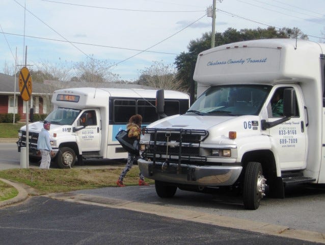 Okaloosa County Transit buses such as these formerly served two routes around the county seat as well as the Wave Express to the south end of the county. Crestview is currently served by the Wave Express only.