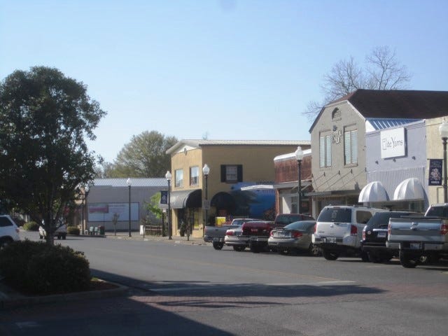 A proposed zoning change would permit residential units in the downtown district, which officials hope will stimulate activity after business hours.