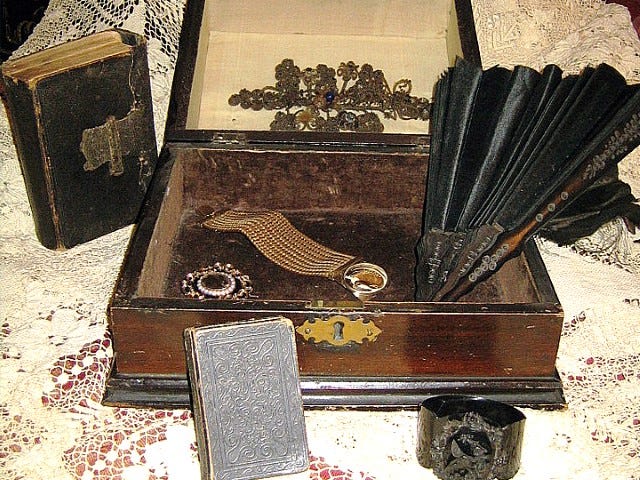 Victorian mourning artifacts in this jewelry box are among materials to be exhibited Saturday afternoon during a living history presentation on Victorian American mourning traditions at the Baker Block Museum.