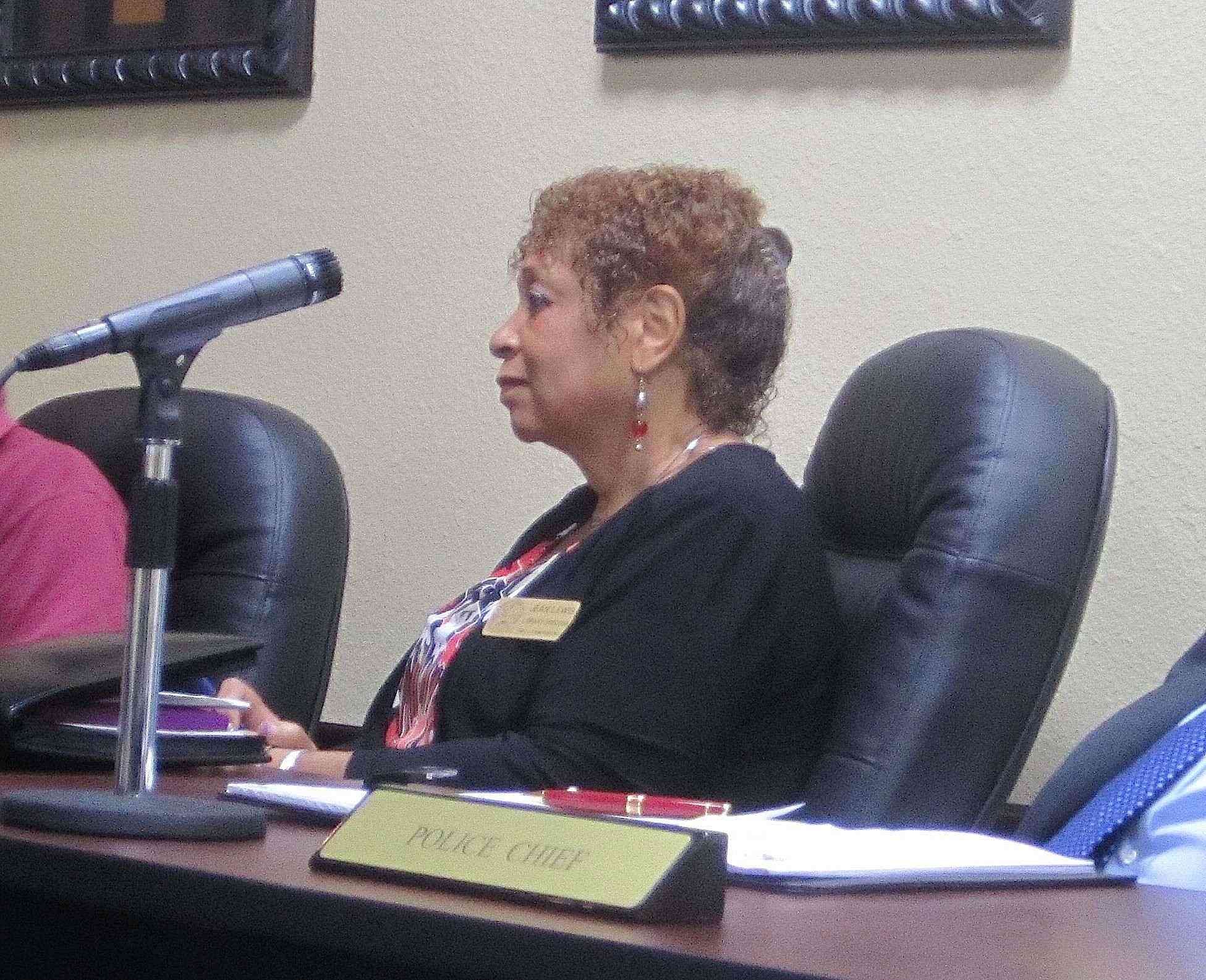 Crestview Public Library Director Jean Lewis observes proceedings during the Monday night city council meeting during which the library's selection policy was approved.