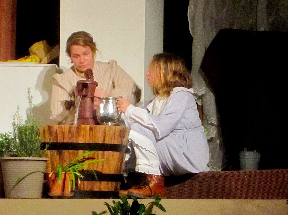 Sarah Hawkins as Annie Sullivan and Brooklyn Onuffer as Helen Keller perform the famous water pump scene from "The Miracle Worker" at Warriors Hall. Performances continue Saturday and Sunday.