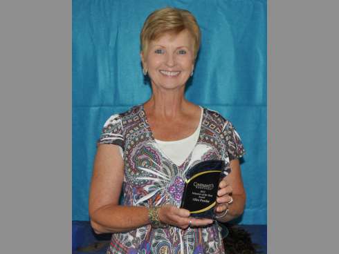 Crestview resident Alice Fowler displays her Volunteer of the Year award following Covenant Hospice’s volunteer appreciation luncheon on April 16.