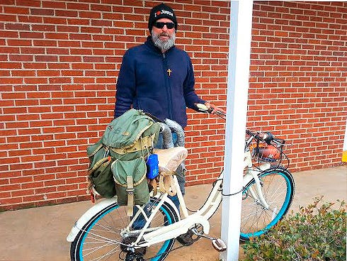 David Payne, who stays in a tent behind Publix on South Ferdon Boulevard, now has a bicycle that he can ride to the Crestview Area Shelter for the Homeless’ Helping Hands building.