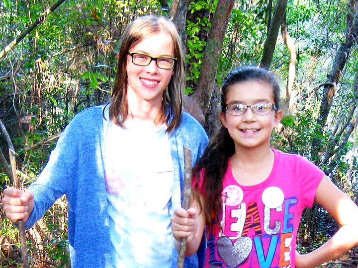 Pen pals Lilly Fischer, 12, and Jordyn Barnes, 11, go hiking in the Crestview area soon after meeting in person for the first time.