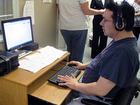 Doug, an Era Burgan Learning Center client, practices computer skills by searching for and navigating to episodes of his favorite TV series.