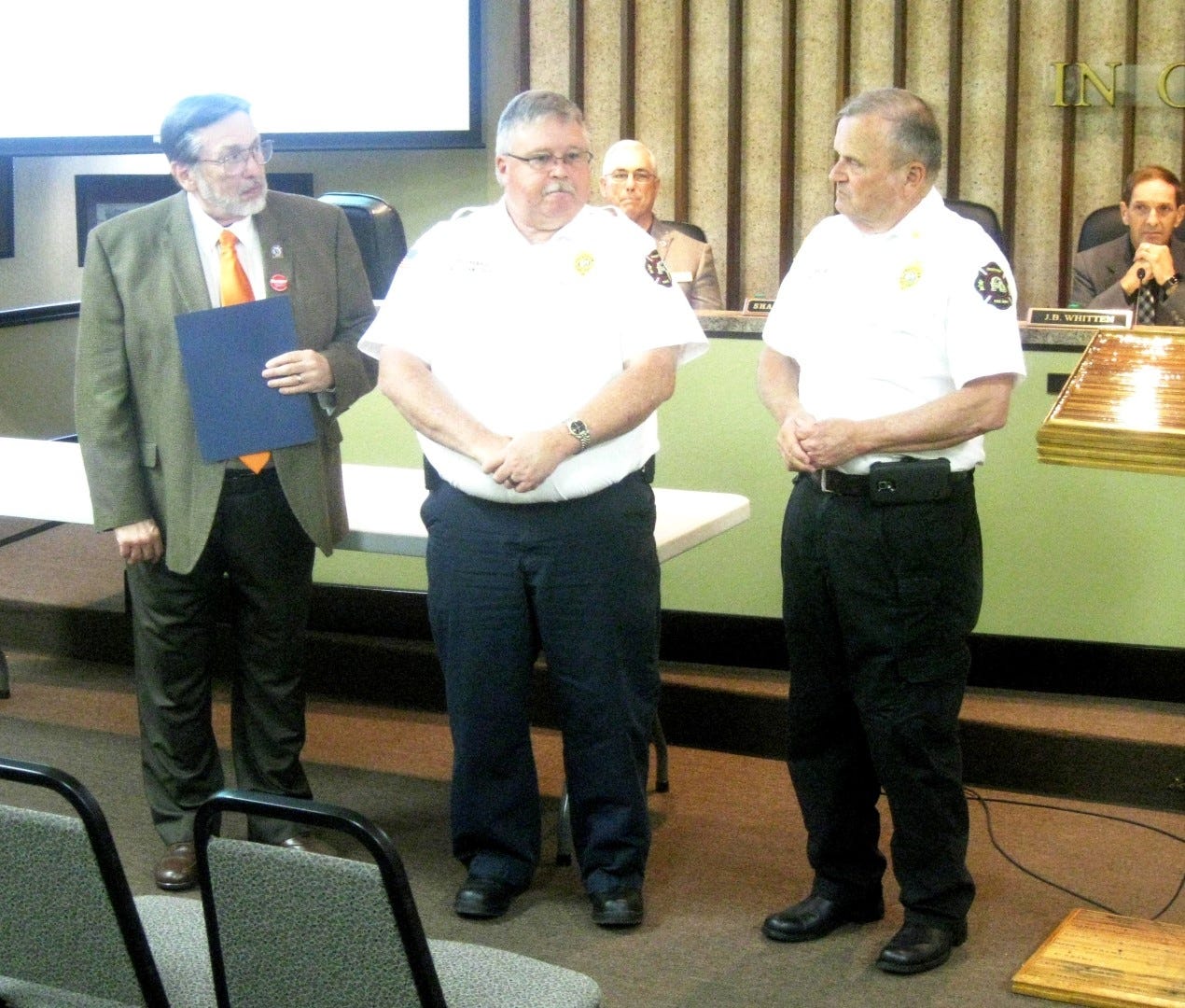 Crestview Fire Department’s training chief, Ralph Everage, center, is honored by Mayor David Cadle and Fire Chief Joe Traylor for his 25 years of service to the city.

(BRIAN HUGHES | News Bulletin)
