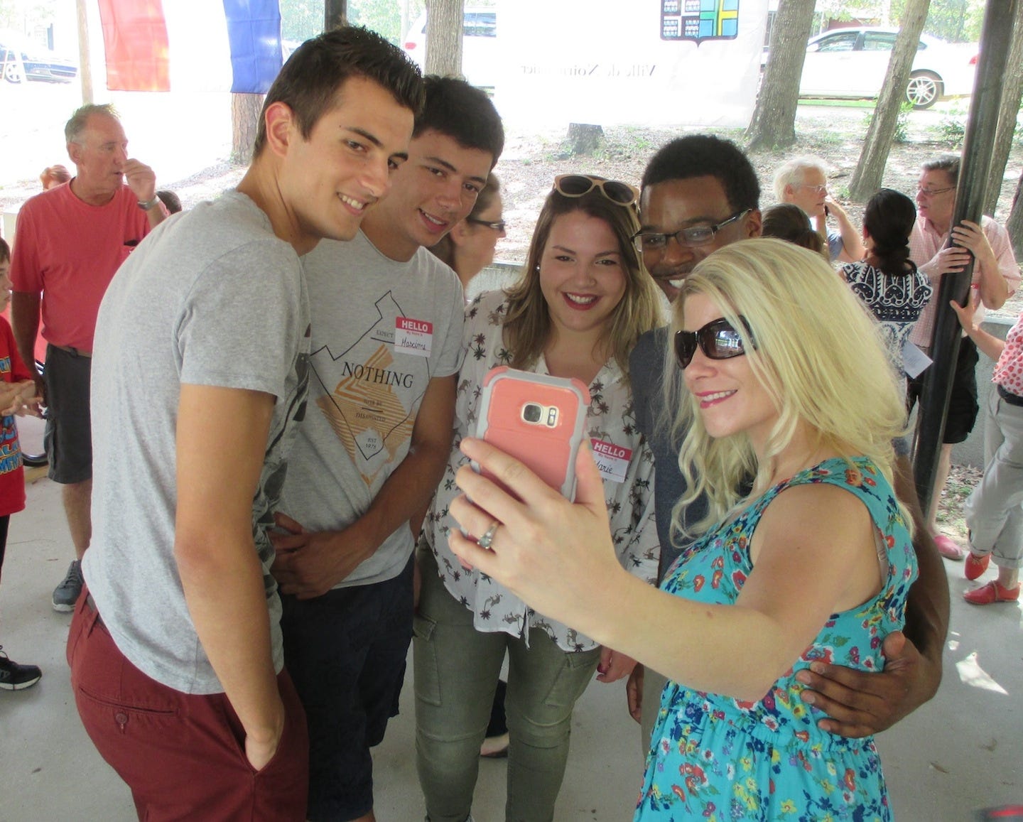Crestview and Okaloosa County’s Sister City friendship with Noirmoutier includes an educational component. Here, Clément Pineau, Maxime Chardonneau and Marie Gaborieau take a selfie with Crestview resident and Northwest Florida State College alumnus Montavius Diamond, who has twice visited Noirmoutier, and Niceville resident Ashley Ribando, who has visited Noirmoutier several times. The students attended the Crestview Area Sister City Program’s Sept. 24 picnic. BRIAN HUGHES | News Bulletin
