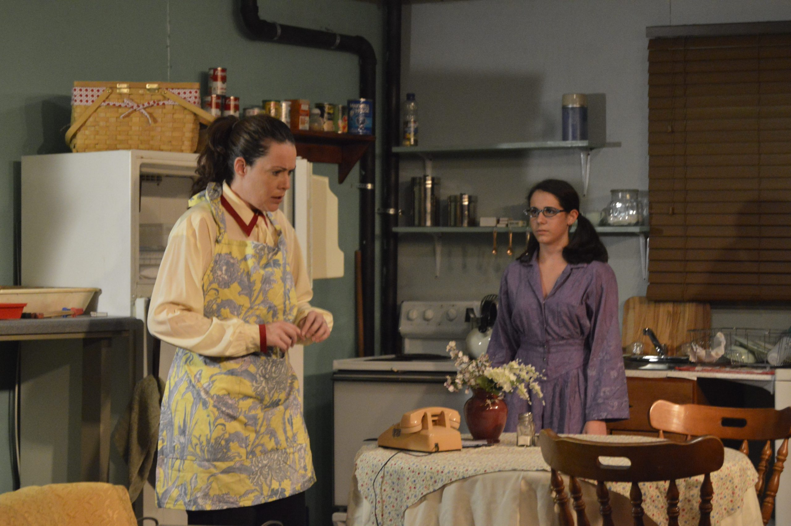 Katie Foley, who plays Susy, performs a scene from 'Wait Until Dark' with Rina Champlin, who plays Gloria. (MATT BROWN | Press Gazette

)