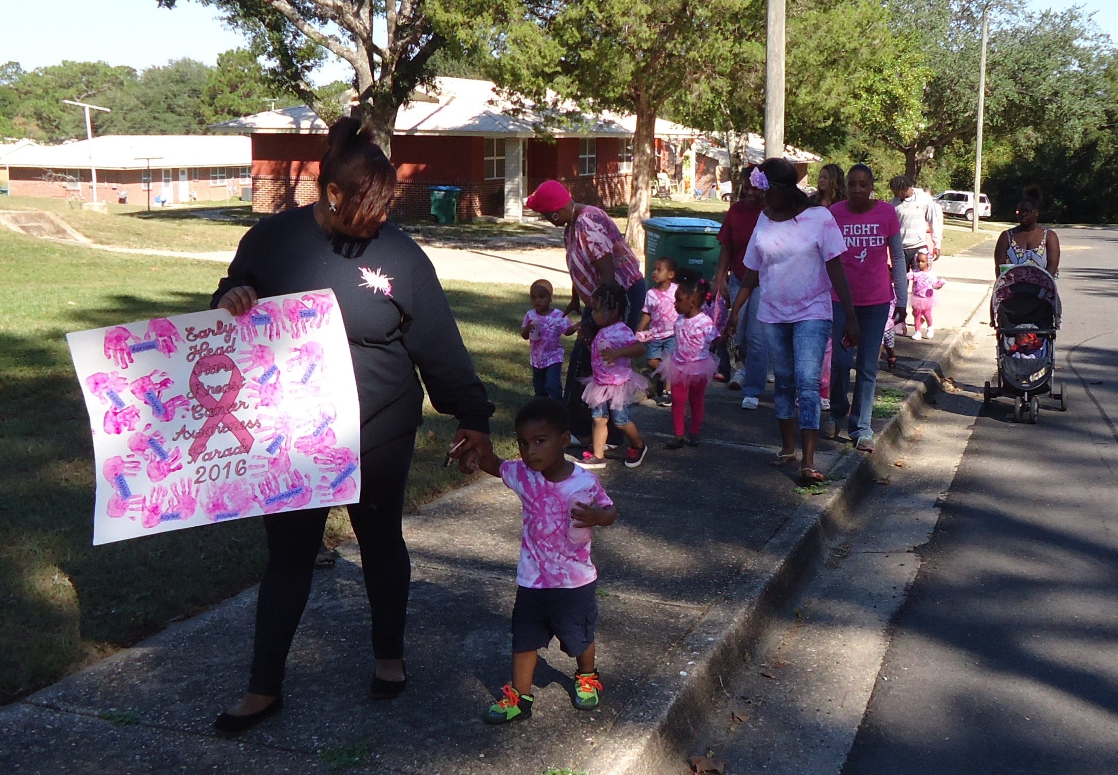 Children at the Head Start Kennedy Center in Crestview wear pink to show support as they parade for breast cancer awareness in Crestview. (Special to the News Bulletin)
