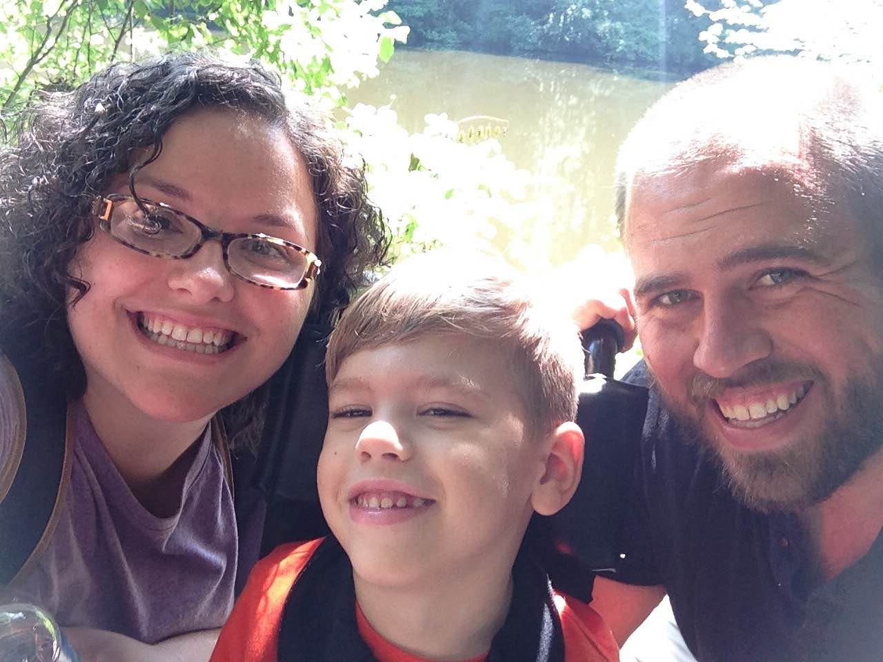 Tammy Owens, left, and her husband, Jared, work with Living Truth Church in Pace to provide respite care for families with special-needs children. The couple — whose son, Silas, center, has cerebral palsy — knows the joy and hardships these families face. (Special to the Press Gazette)