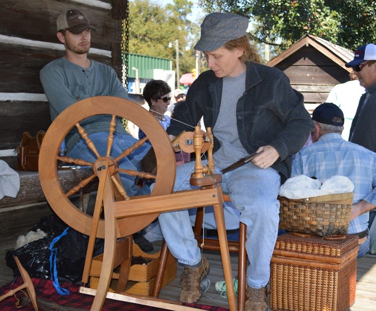 Sheila Moores of Milton spins yarn at a previous Heritage Day in Baker. The next annual Heritage Day is 9 a.m. to 3 p.m. Nov. 5 at the Baker Block Museum. Admission is free of charge. Special to the News Bulletin