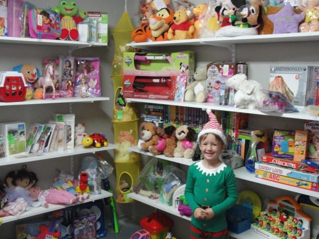 Xavier Simmons stands among hundreds of toys donated to Lifepoint’s Kids Mart. SAMANTHA LAMBERT | News Bulletin