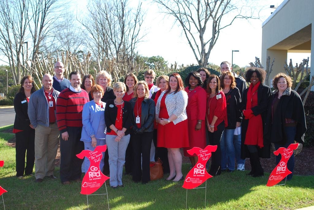 The North Okaloosa Medical Center celebrated the American Heart Association's Go Red effort with a program on women's heart health Feb. 5 in Crestview. Go Red team members are pictured, and are NOMC employees unless otherwise stated. Front: Greg Clark, Rehabilitation Therapy director; Ronnie Daves, CEO; Brenda Clark, Pharmacy department; Chrissy Howell, Kindred at Home; Lainie Hines, Physician Practices director; Ingrid Alderfer, Okaloosa/Walton AHA regional director; Zenobia Richardson, Crestview Mayor David Cadle's executive assistant; Jennifer Gillis, Case Management director; Barbara Gordon, NOMC Healthy Woman Advisory Board; Angela Carden advisory board member; NOMC Healthy Woman Advisory Board, Dawn Mann; NOMC Healthy Woman Advisory Board. Back Row- Jennifer Laskaskie, Kindred at Home; Chris Green, CFO; Carrie Bryant, Director of Nursing; Teresa Balcerak, Human Resources coordinator; Darlene Jones, Engineering administrative assistant; Carol Barberree, nursing director; Jenny Sander, Information Technology; Sherry Richardson, Emerald Coast Hospice; Tom Gordon, Gordon Martial Arts.