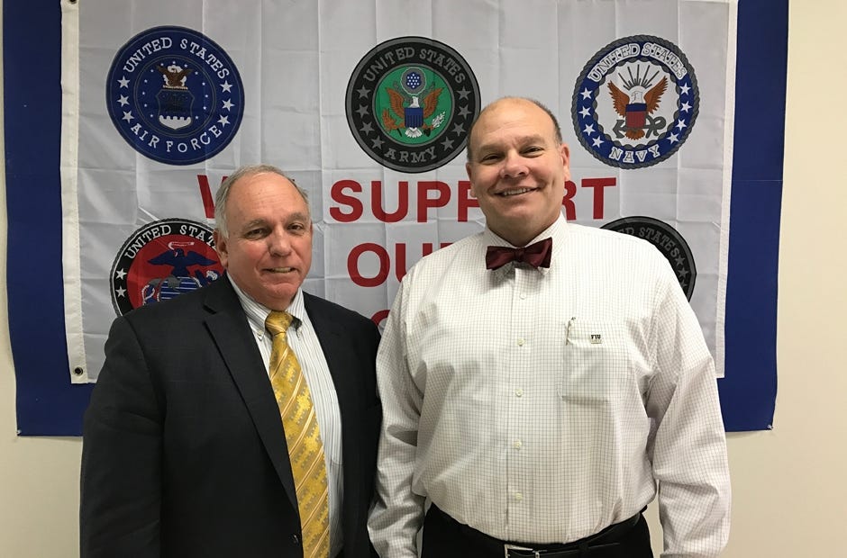 Pete Gutierrez (left) and Gary Perez (right) from Florida International University are helping to bring medical classes to Crestview. They seek to open an FIU satellite campus in the area. MARK JUDSON | News Bulletin