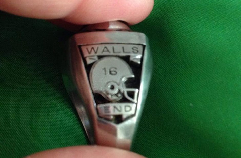 Scott Walls is believed to be this ring's owner. His name is engraved inside and featured on the side. JEAN TODD | Photo