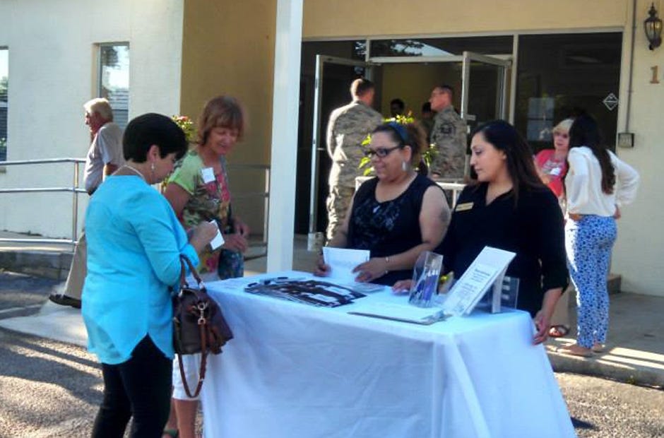 Volunteers and residents attend an open house event for Shelter House. The local office is located at 290 Martin Luther King Avenue in Crestview but the actual shelter's location is confidential. [Photo courtesy of Shelter House]