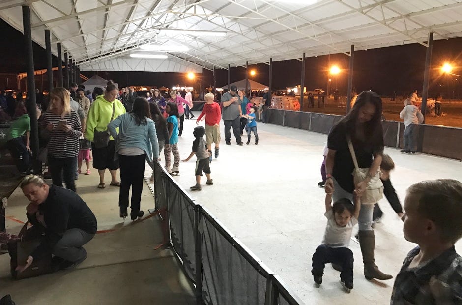Winterfest's ice skating rink was composed of panels that mimicked the slickness and grip of actual ice. The surface offered an ice-like experience without the cold. [MARK JUDSON/NEWS BULLETIN]