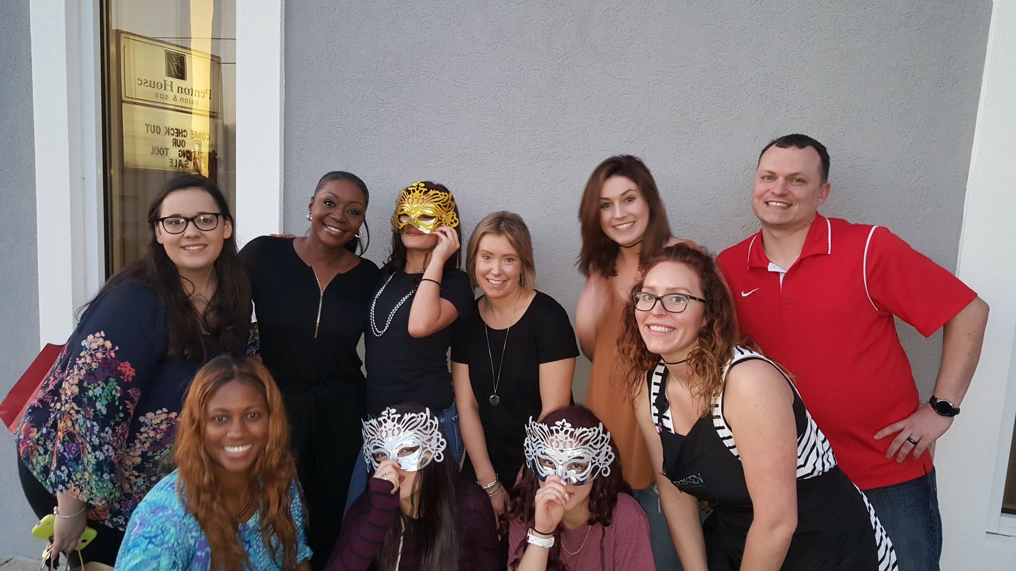 A day of beauty for at risk and trafficked youths took place Feb. 19 at Penton House Salon and Day Spa in Pace. Pictured are event organizers, facilitators and masked teenage girls. Top row, from left, are Hailey Currington, Tracie Esmond, unidentified teenager, Caroline Gibson, April Dukes and Ryan Bullard. Bottom row: Asibi Carnegie, two unidentified teens and Abby Chilcutt. [Special to the News Bulletin]